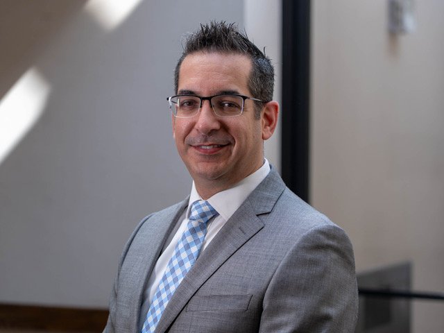 Dr. George Karaouzas